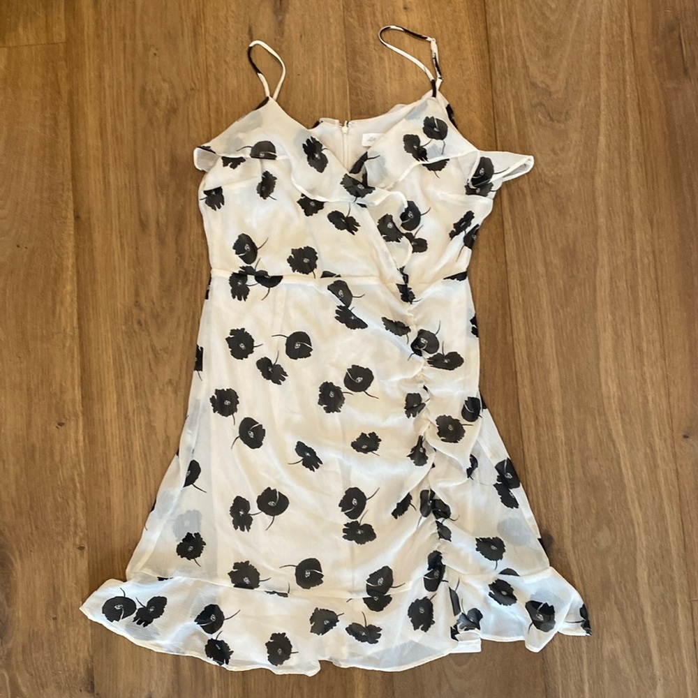 White mini dress with black flowers lightly worn